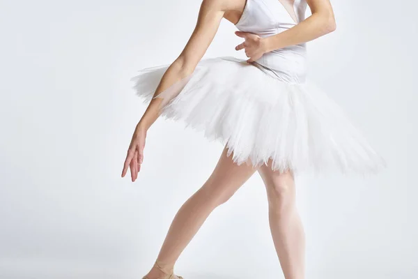 Ballerina white tutu dance exercise performance light background — Stock Photo, Image