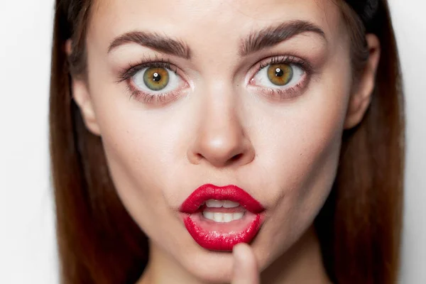 woman with red lips close-up open mouth emotions