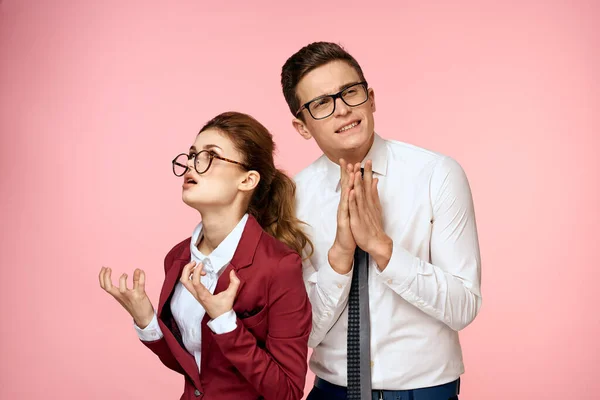 Business man and woman office work colleagues team office management studio pink background — Stock Photo, Image