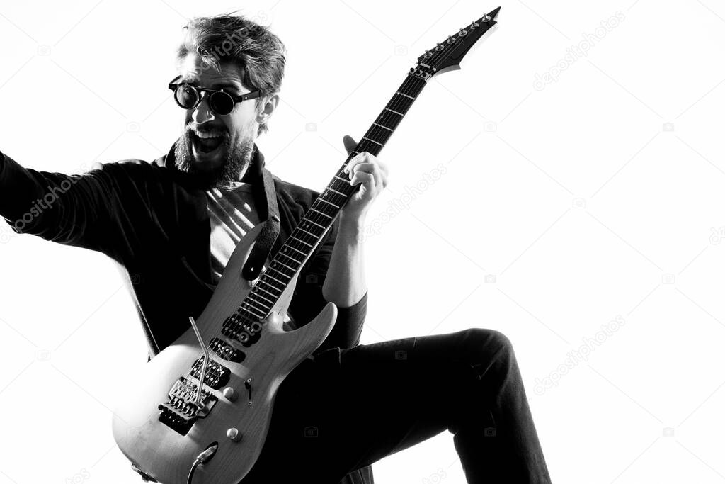 Musician with guitar rock star emotions entertainment modern performer