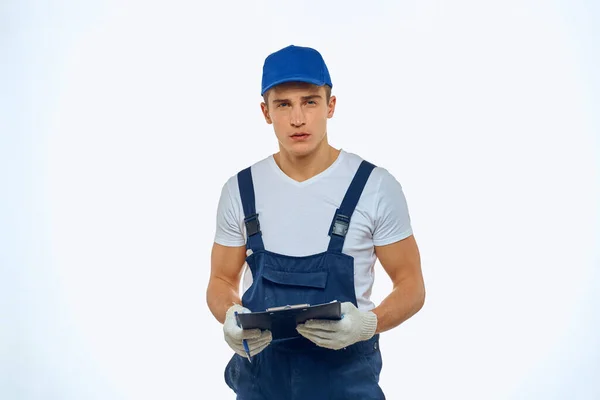 Working man in uniform documents delivery service courier — Stock Photo, Image