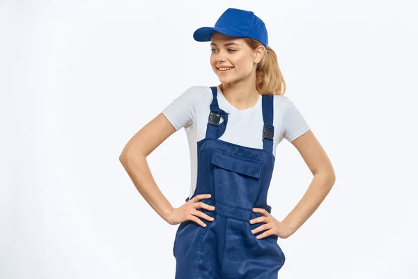 Stock image Woman in working uniform blue cap delivery courier delivery service