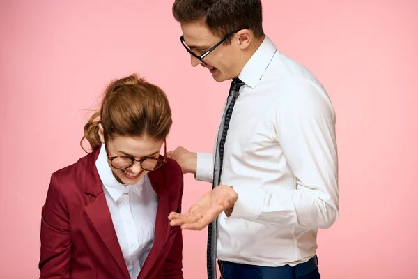 Business man and woman office work colleagues team office management studio pink background — Stock Photo, Image