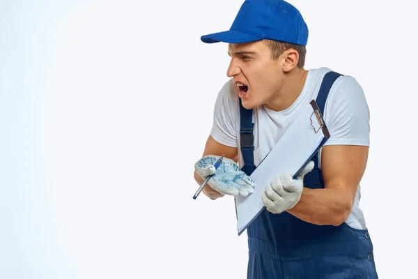 Working man in uniform documents delivery service courier — Stock Photo, Image