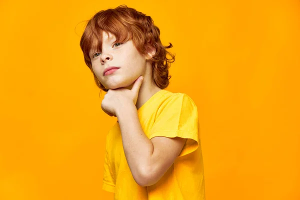 Pensive redhead boy planning something interested facial expression — Stock Photo, Image