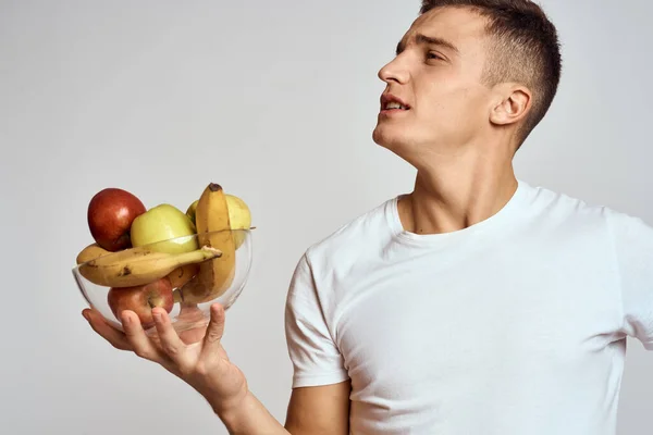 Man with fresh fruit in a cup health lifestyle healthy nutrition vitamins — Stock Photo, Image