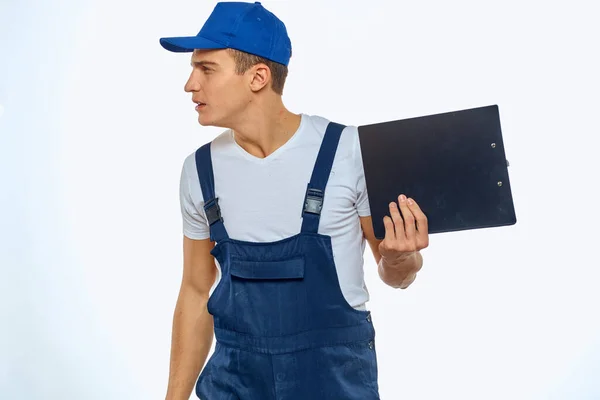 Working man in uniform documents delivery service courier — Stock Photo, Image