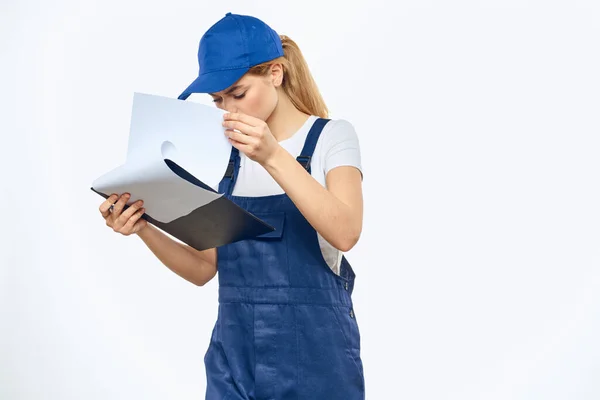 Working woman in uniform documents delivery service courier services — Stock Photo, Image