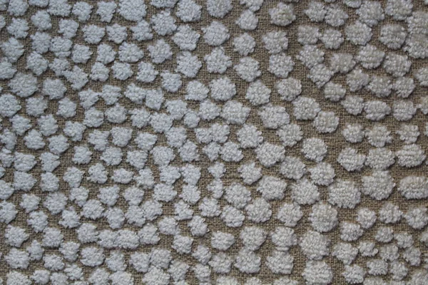 Doku zarif beyaz-bej kumaş desen daireler ile. Web tasarımı için bir arka plan, duvar kağıdı için kullanmak mümkündür.