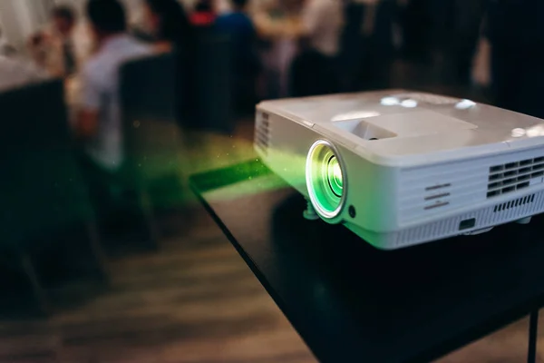 Close View Projector Showing Film Audience Stock Photo