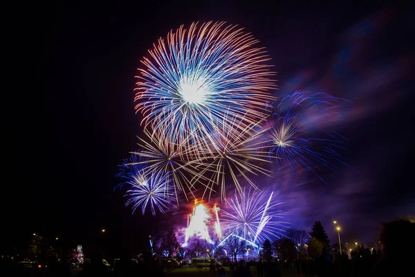 Colorful fireworks on dark sky — Stock Photo, Image