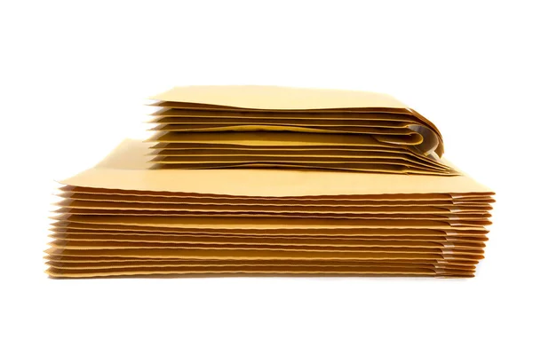 Stack of padded mailing envelopes isolated — Stock Photo, Image