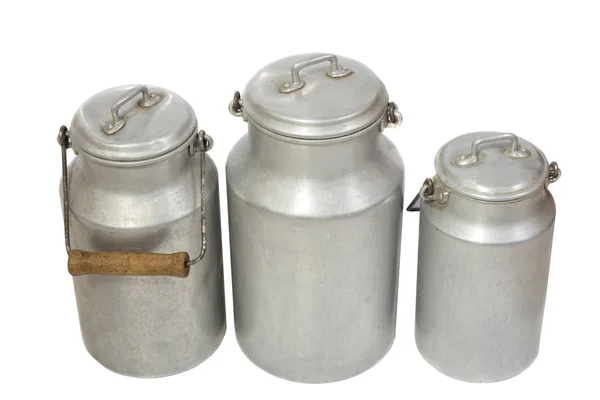 Retro aluminium milk jugs, white background. — Stock Photo, Image