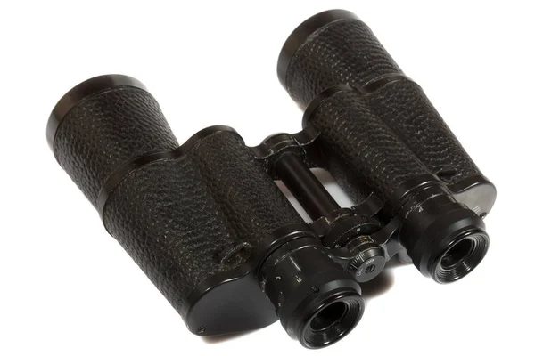 Black binoculars on white background. — Stock Photo, Image
