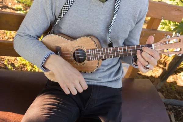 Young man playing ukulele. — Stock Photo, Image