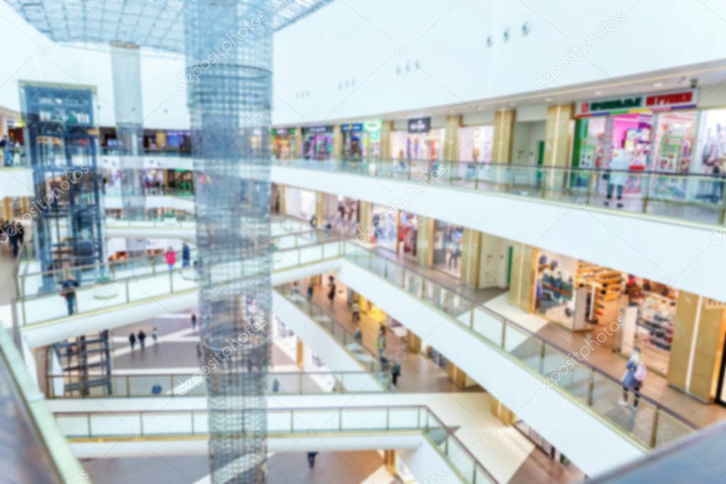 Abstract mall, multilevel shopping center, blurred focus. Mall Interior