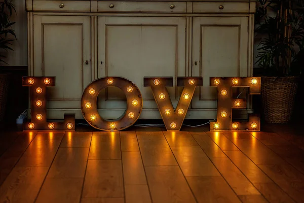 Love Word Glowing Light Bulbs Standing Floor — Stock Photo, Image