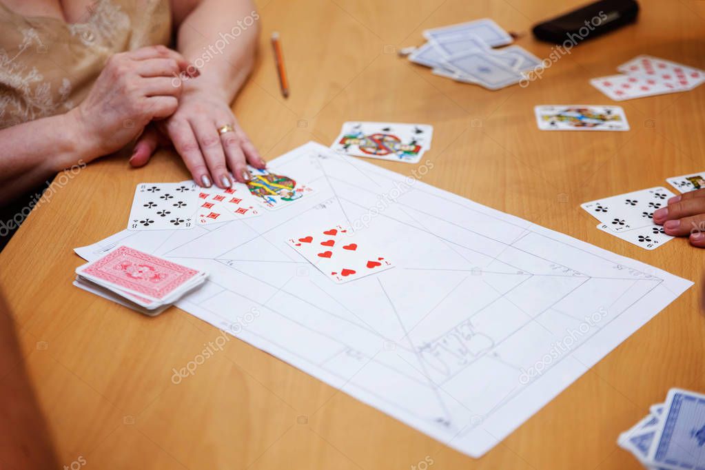 close up view of cards in hands