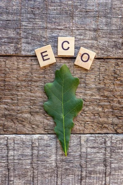 Inscription Eco Letters Word Oak Leaf Old Rustic Wooden Backdrop — Stock Photo, Image