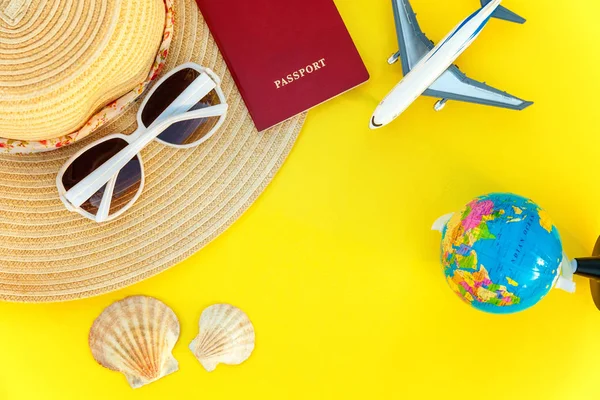 Flat Lay Hat Plane Passport Globe Sunglasses Shell Yellow Colourful — Stock Photo, Image