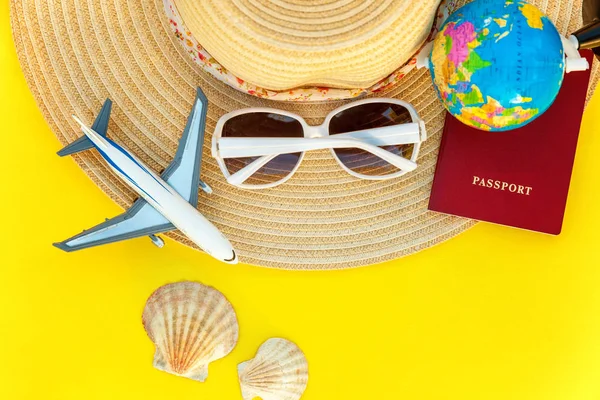 Flat Lay Hat Plane Passport Globe Sunglasses Shell Yellow Colourful — Stock Photo, Image