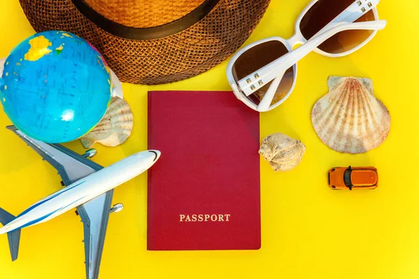 Flat Lay Hat Globe Plane Passport Sunglasses Shell Yellow Colourful — Stock Photo, Image