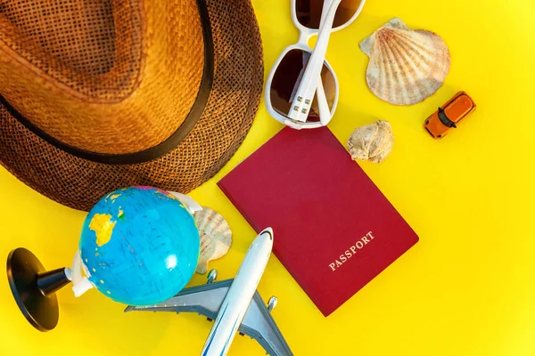 Flat Lay Hat Globe Plane Passport Sunglasses Shell Yellow Colourful — Stock Photo, Image