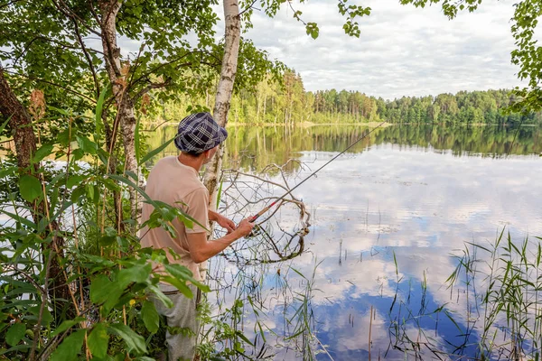 Fiskare med spön — Stockfoto