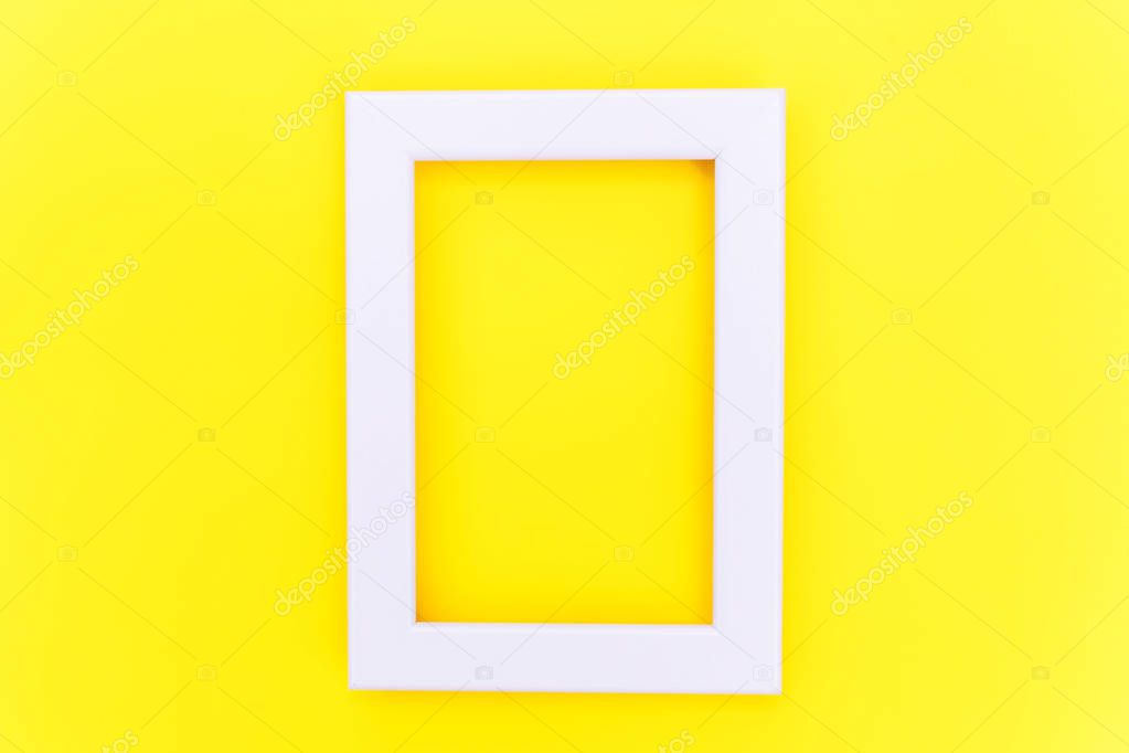 Simply design with empty pink frame isolated on yellow colourful trendy background