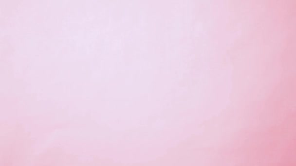 Просто минимальный дизайн женщина рука с медицинским оборудованием стетоскоп или фонендоскоп изолированы на модный пастельно-розовый фон — стоковое видео