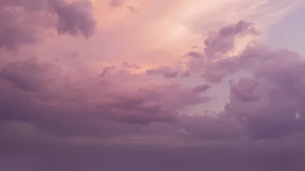 purple and pink clouds in the sky