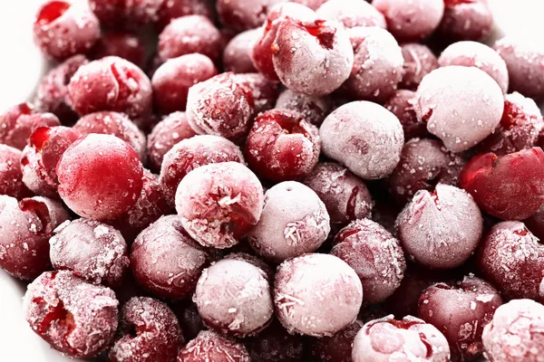 frozen cherry fruit. cherry in ice crystals.