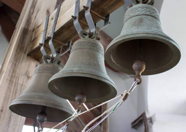 Three bells in the bell tower for notification of the Church Lit