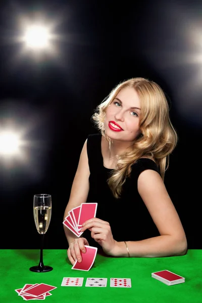 Young girl playing in the gambling — Stock Photo, Image