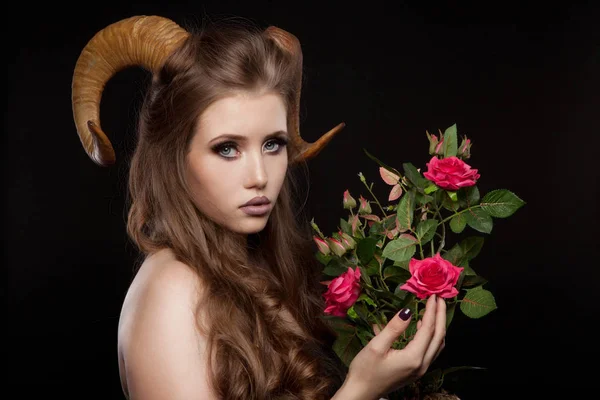 Portrait of an attractive demon woman with horns — Stock Photo, Image