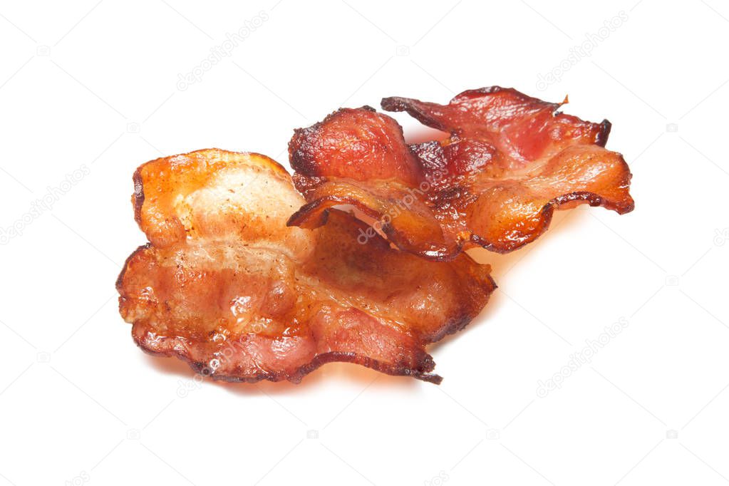 Fried bacon rashers isolated on white background
