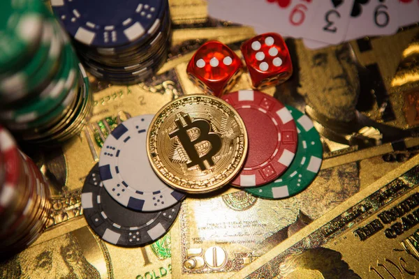 Colorful casino chips, dollars, bitcoins and red dice — Stock Photo, Image