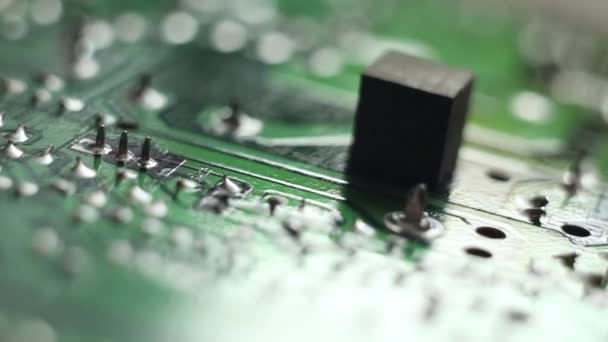 Macro shot of the back side of a circuit board — Stock Video