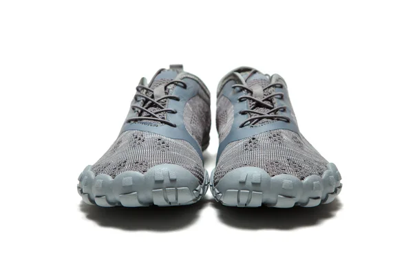 Zapatillas deportivas grises aisladas sobre fondo blanco — Foto de Stock