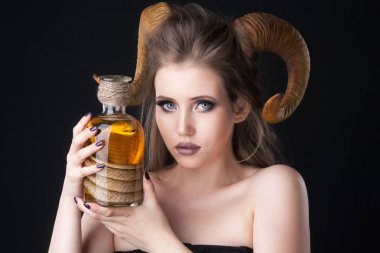 Portrait of an attractive demon woman with horns clipart