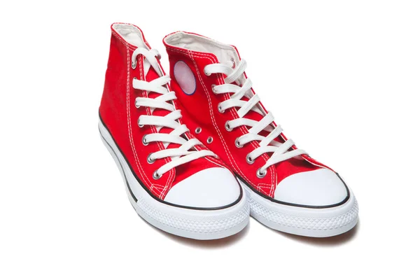 Rode sport schoenen geïsoleerd op witte achtergrond — Stockfoto