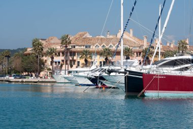 Sotogrande, Spain: 12 February 2011: Luxury yachts and boats in the marina at Sotogrande in Spain clipart