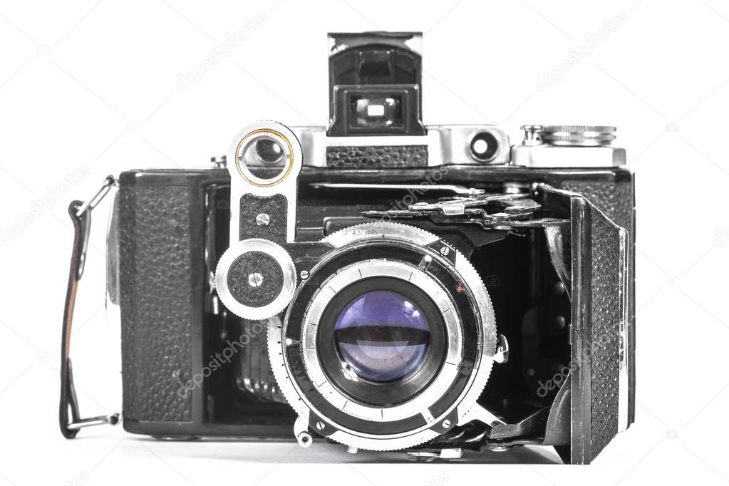 Antique camera with an accordion lens isolate