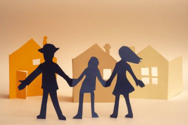 Kağıt insanların evleri arka plan üzerinde kesme.