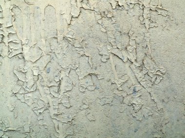 Gri bir duvar eski boya kırık. arka plan, yüzey zaman ve hava tarafından tahrip