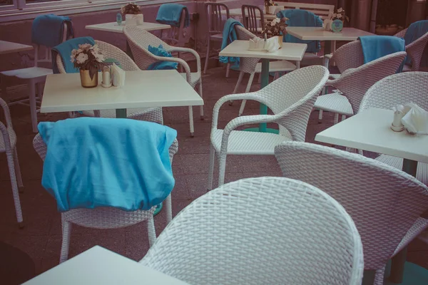 Tables of street cafes.