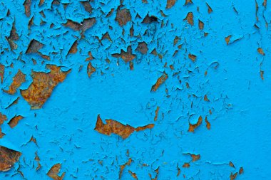 Mavi kırık boya paslı metal doku.