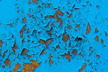 Mavi kırık boya paslı metal doku.