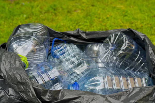 Empty Plastic Bottles Lying Trash Bag Grass — Stock Photo, Image