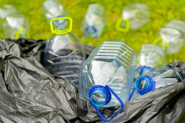 Empty Plastic Bottles Lying Trash Bag Grass — Stock Photo, Image